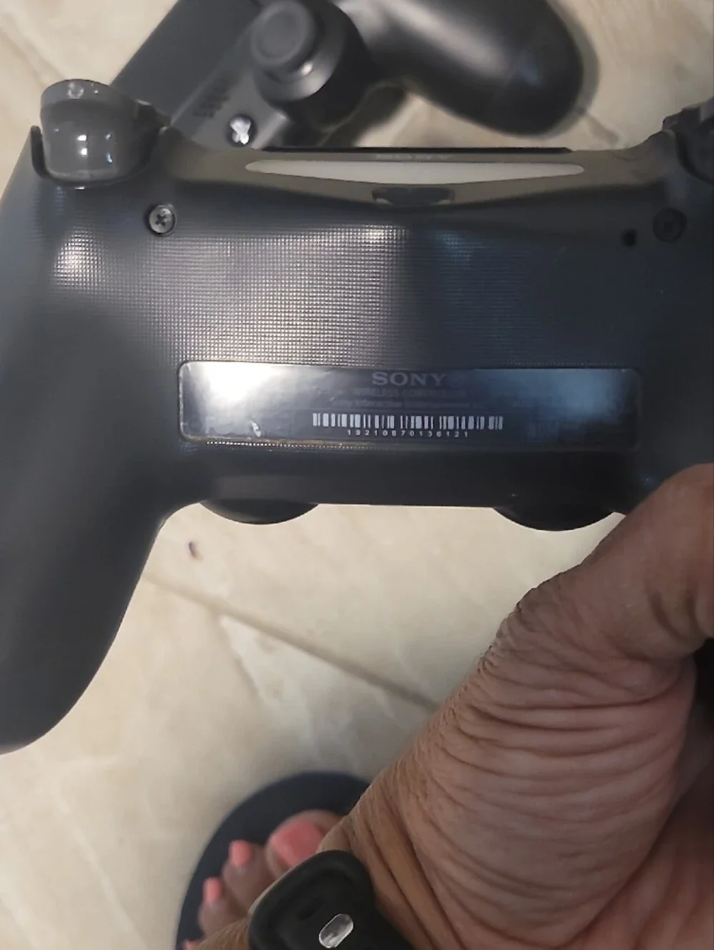 Sony Black PS4 Slim Console with Two Black DualShock Controllers